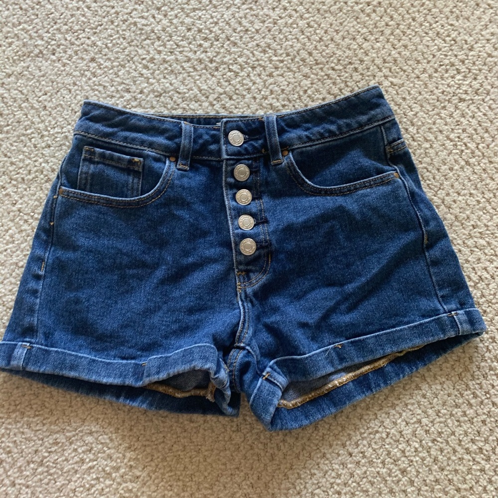 Dark wash mom shorts with button detail!